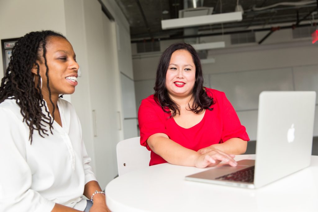 Two multiethnic women during mentorship program