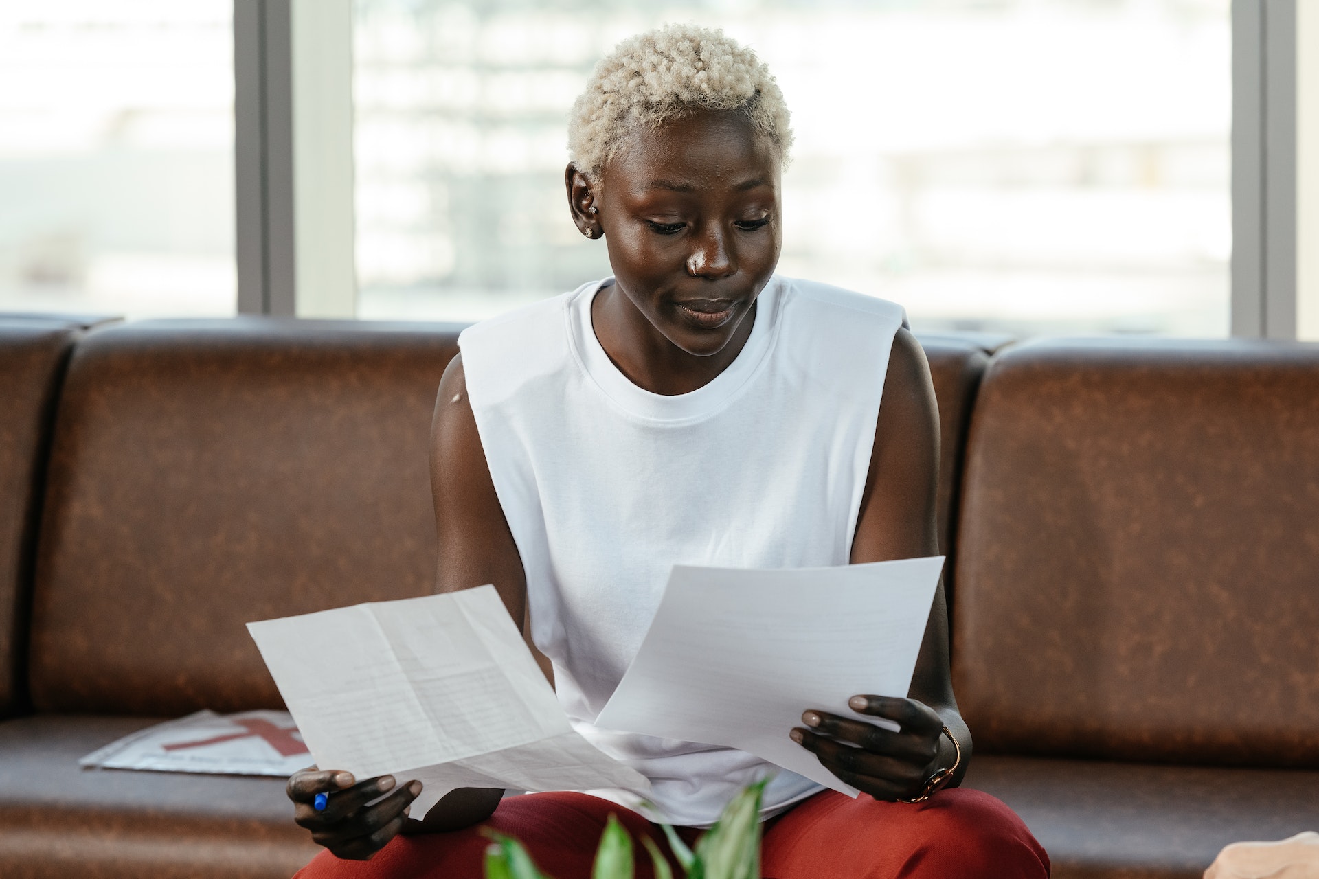 Black woman holding documents