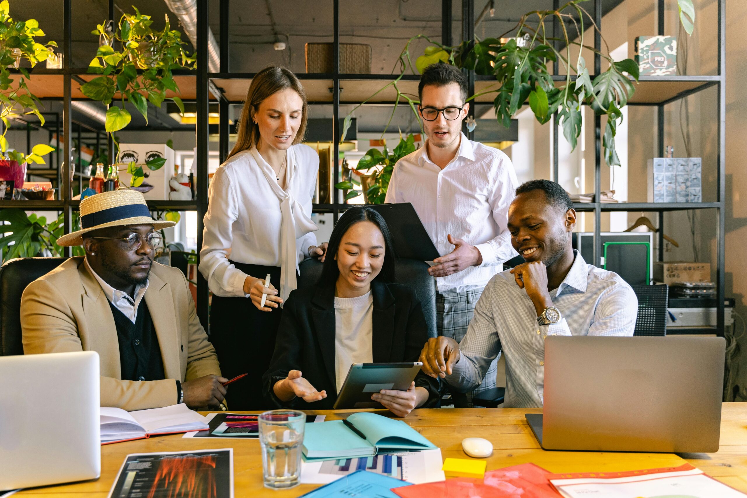 Leaders and employees working in an environment where well-being intelligence is cultivated