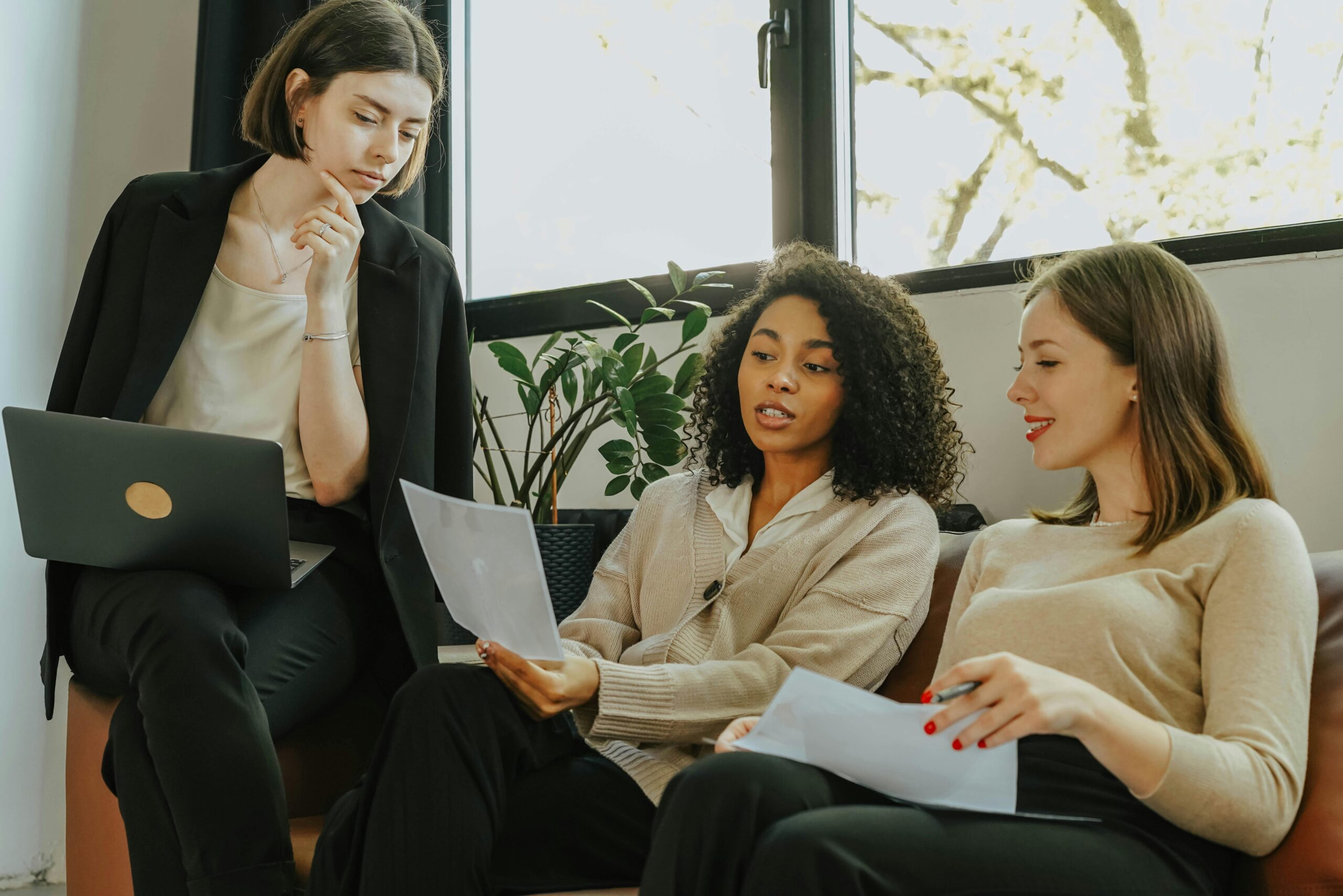 Three women are having a meeting