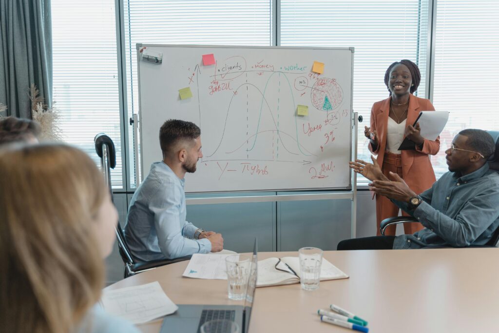 Coworkers in a Conference Room having a Meeting