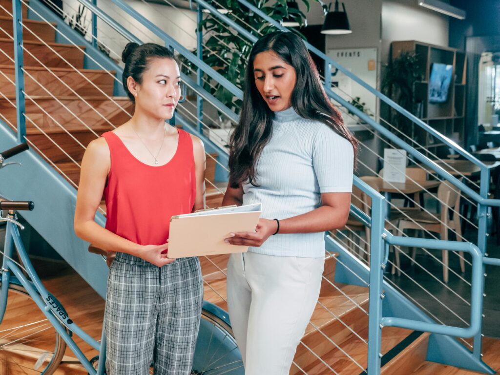 2 colleagues discussing 9 box talent review