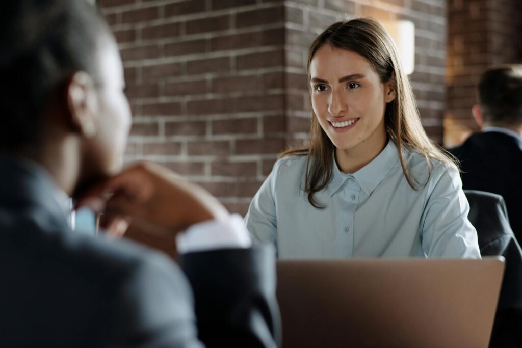 manager discussing with employee about applying for an internal promotion