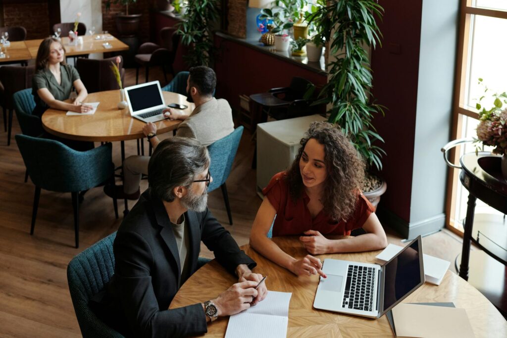 2 HR colleagues discussing the company's people strategy