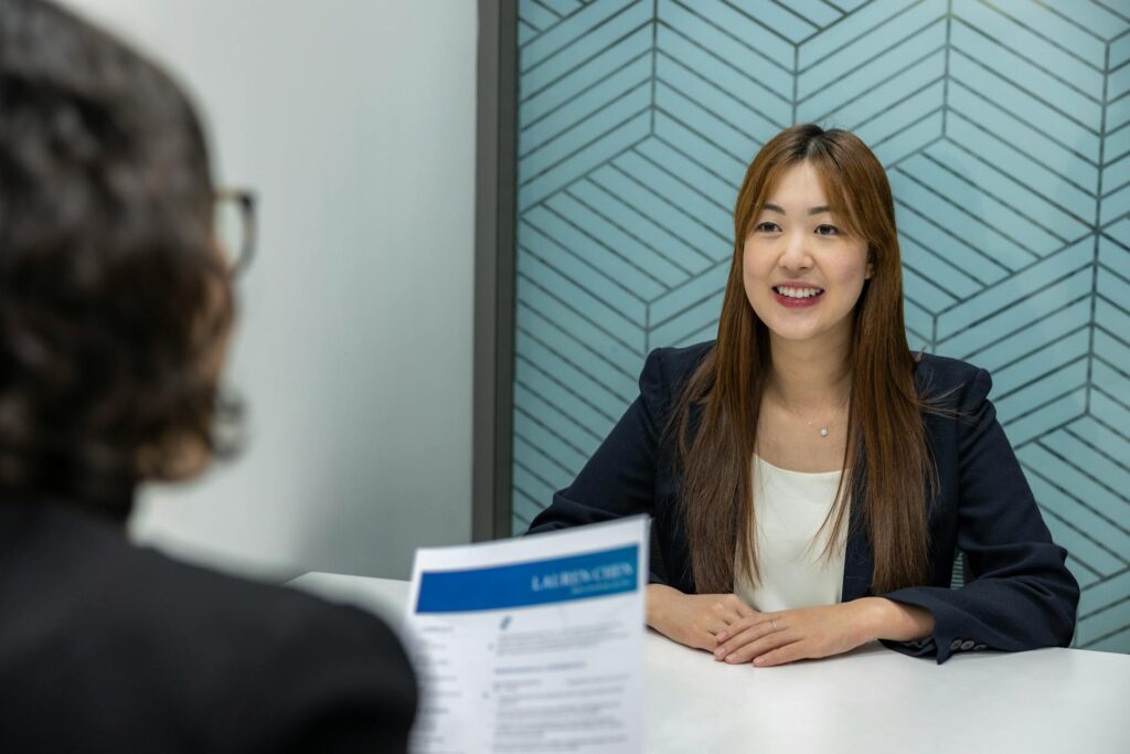 Career coach helping her client review her resume