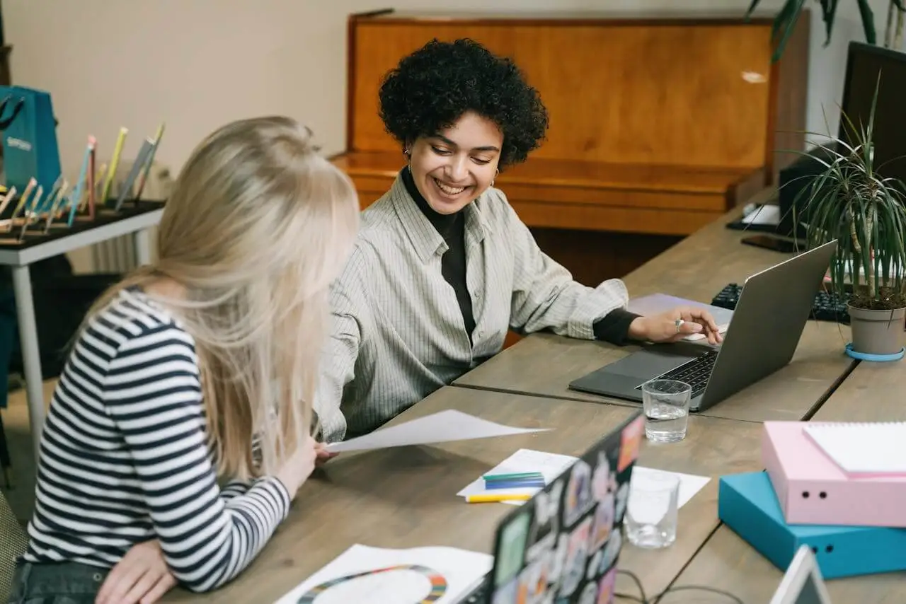 Two-women-colleagues-Working-Together-in-the-Office
