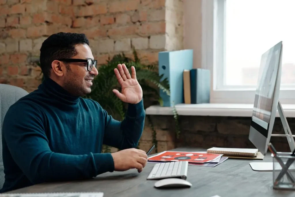 one-on-one hybrid meeting between employee and manager