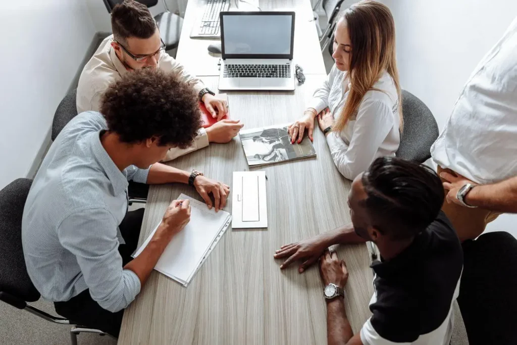 colleagues doing meaningful work in office setting